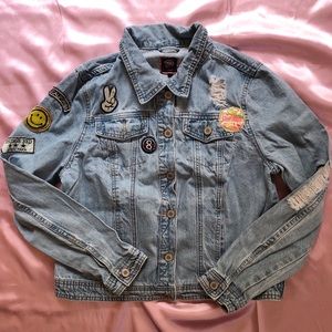 light wash denim jacket with patches